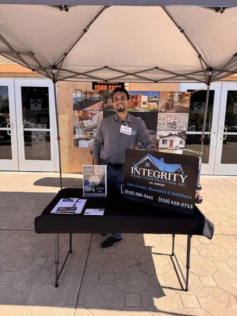 Johan Ocegueda, Vice President, manning the Integrity Home Construction booth